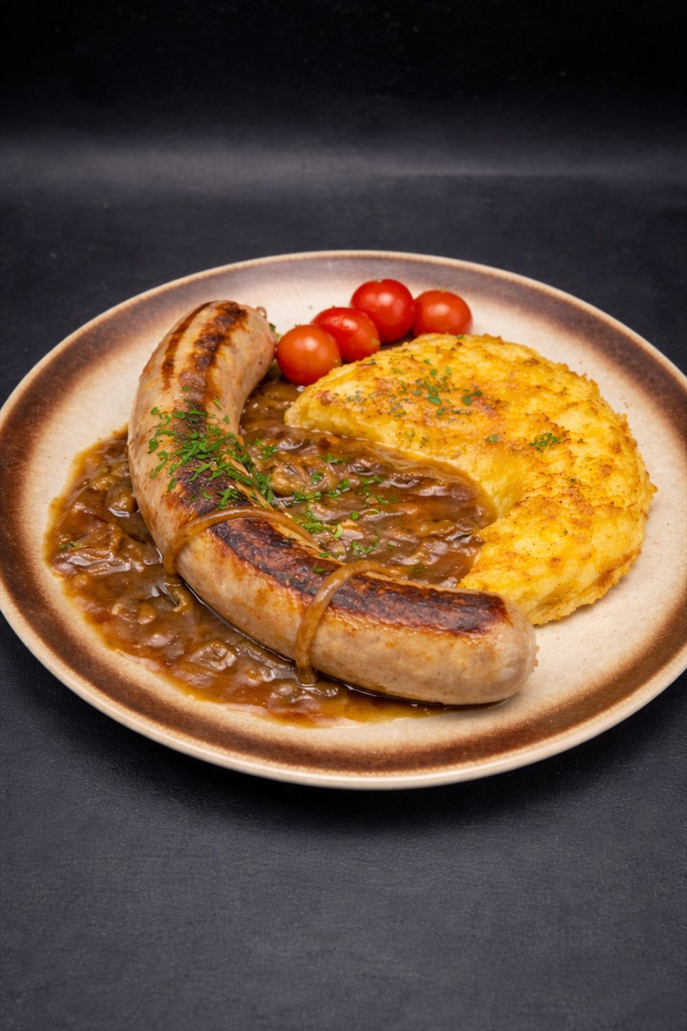 OLMA Bratwurst with rösti and onion gravy